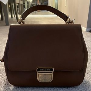 Michael Kors cognac cross body/clutch bag. Almost perfect condition!